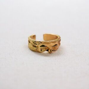 gold half face stoic greek sculpture ring y2k